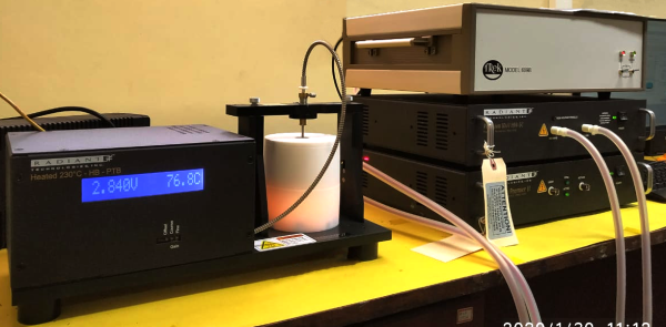 High Voltage Bulk Ceramic Capacitor under piezoelectric test at temperature in a Radiant AutoCal 230°C Thermal Chamber