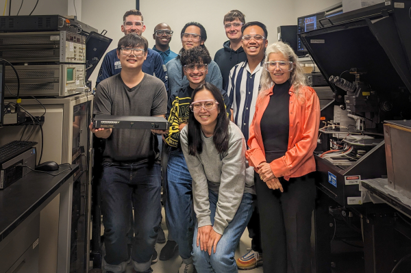 Susan Trolier-McKinstry's group poses with their new RT66C. Photo courtesy of Yiwen Song and Penn State.